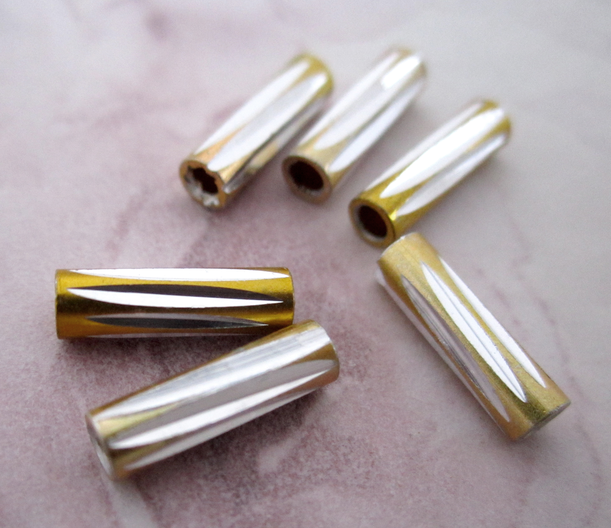 Diamond cut aluminum tube beads at Pitula the Jeweler