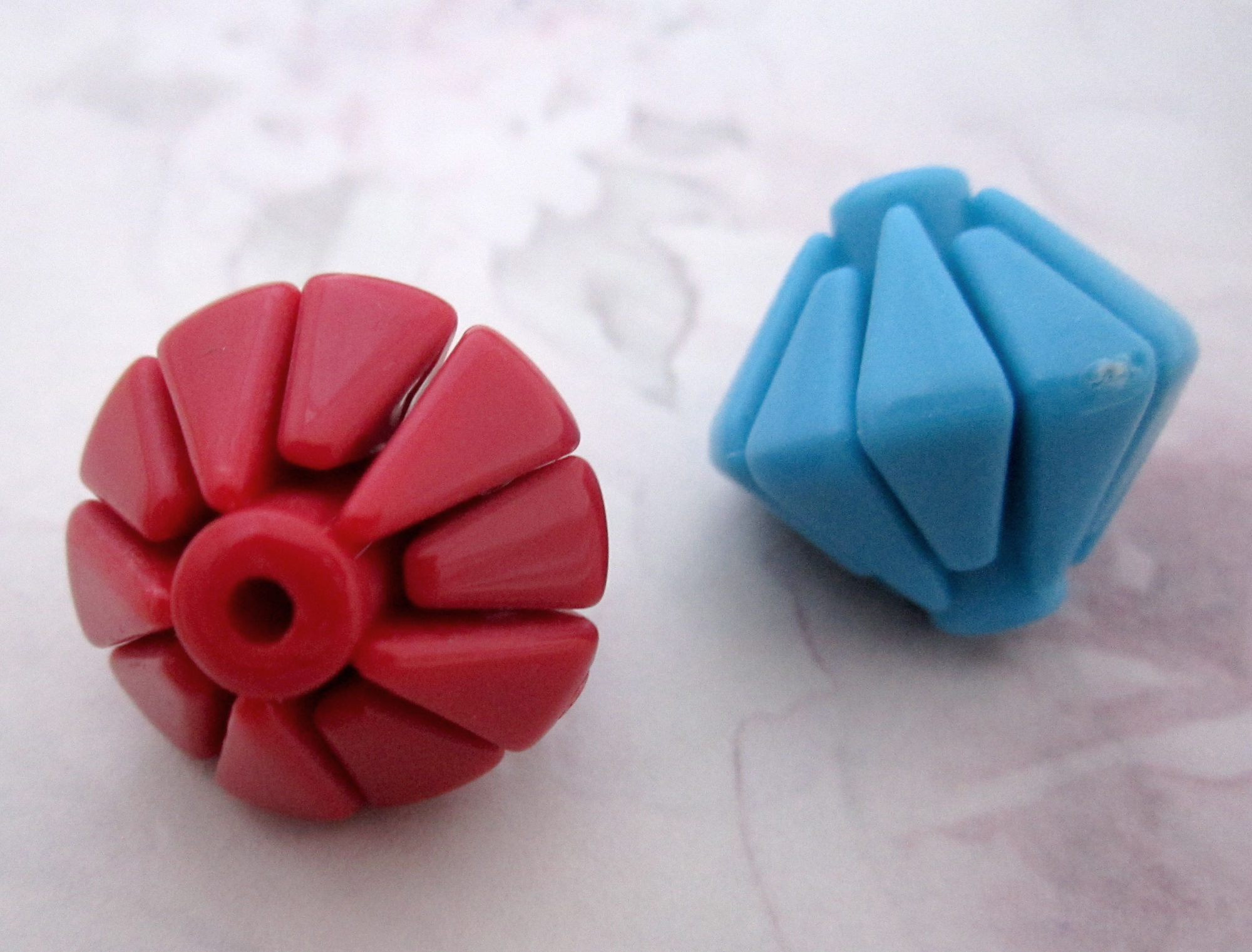 red and blue plastic interlocking puzzle beads at Pitula the Jeweler