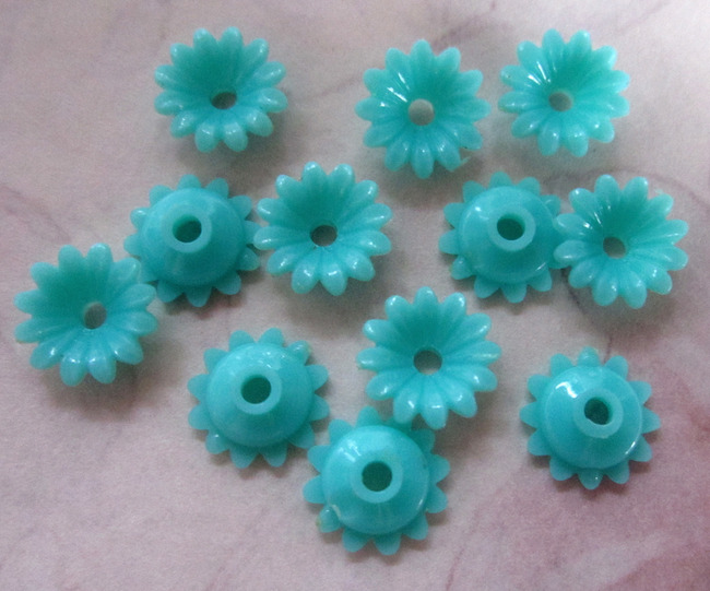 turquoise blue plastic flower beads 9x3mm at Pitula The Jeweler