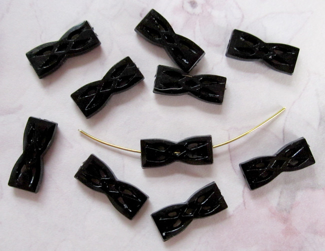 10 pcs. black plastic filigree beads 14x6mm at Pitula The Jeweler